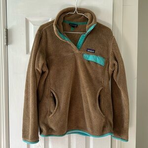 Women’s size large brown Patagonia pullover with blue details